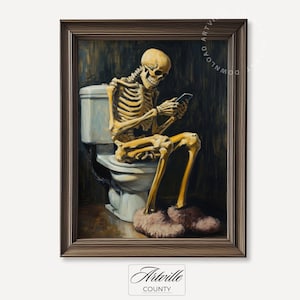 May include: A framed painting depicts a skeleton sitting on a toilet, engrossed in a smartphone. The skeleton is wearing fluffy pink slippers. The artwork is set against a dark background, with the toilet in a light blue hue. The frame is a dark brown color.