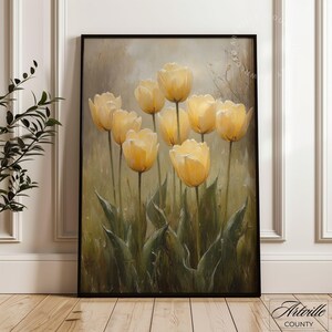 May include: A painting of a bouquet of yellow tulips with green leaves against a soft, muted background.