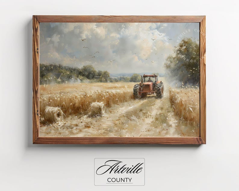 Puede incluir: Pintura de paisaje enmarcada que representa un tractor rojo en un campo de trigo. La obra de arte presenta un marco de madera r&uacute;stico, un cielo nublado y balas de heno. La pintura est&aacute; firmada "Artville County".