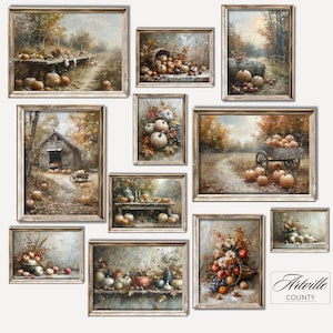 May include: A selection of framed art prints showcasing autumnal scenes. The artwork depicts pumpkins, gourds, and fall foliage in various settings, including a barn, a cart, and a table. The colour palette includes warm tones of orange, brown, and gold.