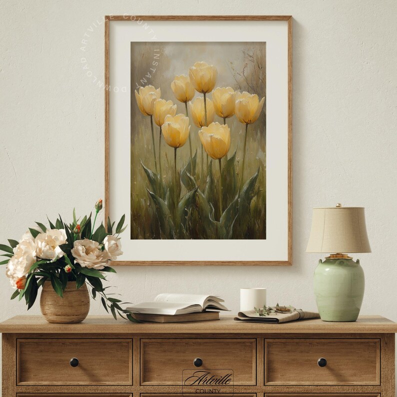 May include: A framed painting of a bouquet of yellow tulips with green leaves against a muted background.