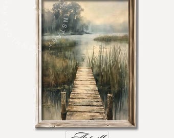 May include: A framed watercolor painting of a wooden dock extending into a misty lake. The dock is surrounded by tall green reeds and trees in the background. The painting has a soft, muted color palette.