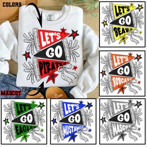 May include: A light gray sweatshirt featuring a "Let's Go Pirates" design in red, black, and white. The design includes stars and ribbons. Additional designs show "Let's Go" with different mascots and colors.