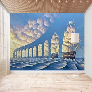 Puede incluir: Una pintura surrealista de dos barcos navegando en un oc&eacute;ano azul con un puente en el fondo. El puente est&aacute; hecho de arcos y est&aacute; parcialmente oscurecido por nubes. Los barcos tienen velas blancas y navegan hacia el horizonte.