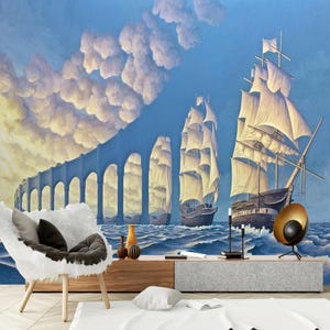 Puede incluir: Una pintura surrealista de tres barcos de vela con velas blancas, navegando por un oc&eacute;ano azul con nubes blancas en el cielo. Los barcos navegan hacia un puente de arco de piedra que parece flotar en el aire.