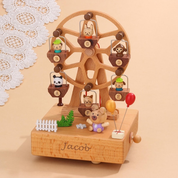 Caja de música de madera con forma de noria personalizada, hecha a mano, con nombre grabado, ideal para baby shower o para el primer cumpleaños.