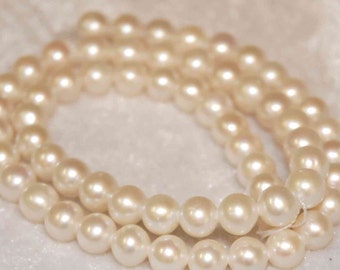 Freshwater Pearl AA Round Ivory White Genuine pearl--7mm1/3 strand 20pieces--good for any design  #RP1003