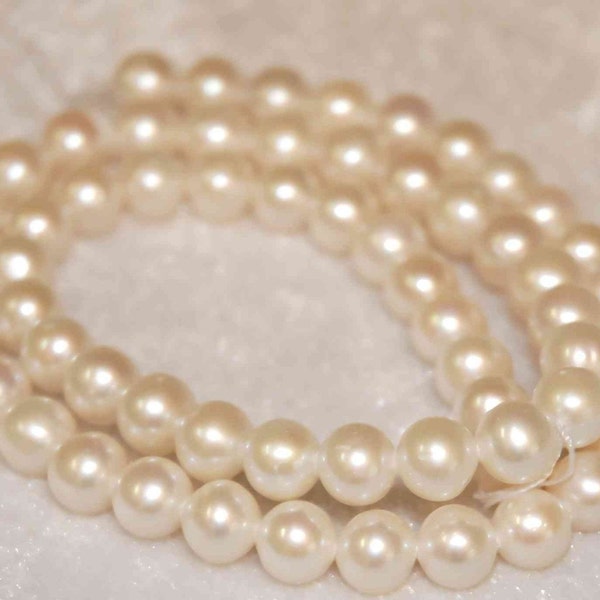 Freshwater Pearl AA Round Ivory White Genuine pearl--7mm1/3 strand 20pieces--good for any design  #RP1003