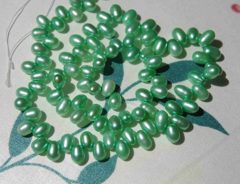 Top drilled Dancing Rice Freshwater Pearl apple green 5X8mm AAA Gem quality briolette tear drop pearl beads 15 full strand 85 pc #DR3136