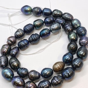 NUOVO Saldi 8-9mm X10-11mm Perle di riso barocche Tahiti look pavone blu Perle d&#39;acqua dolce--15&quot; filo completo 37 pz #DR3401