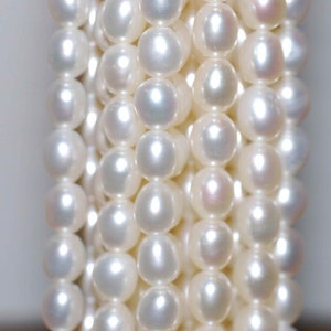 AA- AAA High quality full Strand of 6-7MMX 8mm stunning luster White Ivory Rice oval freshwater Pearl 15"  genuine pearl beads---Deal SALE