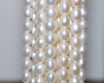 AA- AAA High quality full Strand of 6-7MMX 8mm stunning luster White Ivory Rice oval freshwater Pearl 15"  genuine pearl beads---Deal SALE