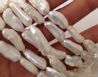 AAA Biwa Pearl Beads: White Ivory Freshwater Stick Strand (16", 24-26mm)
