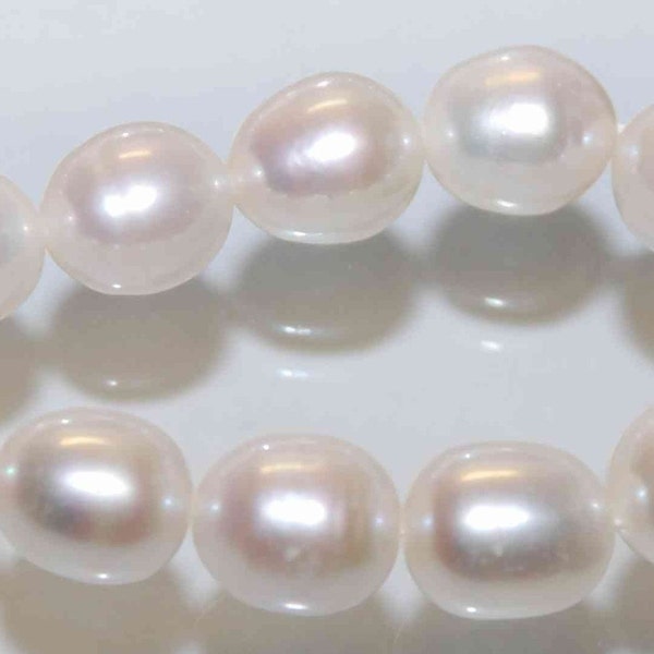 AA 10X12mm LARGE Rice Freshwater Pearl ivory white oval loose pearl beads----HALF strand ---New arrival Sale