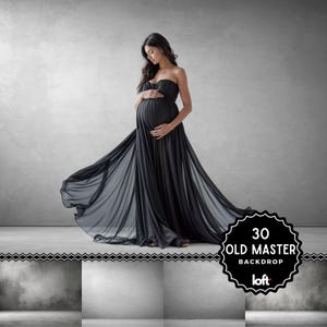 May include: A pregnant woman in a black flowing gown poses against a gray textured backdrop. The gown has a strapless neckline and a flowing skirt. The woman is looking down at her stomach. The image is labeled "30 Old Master Backdrop loft".