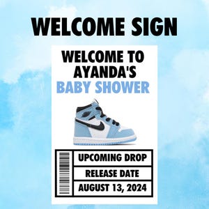 Puede incluir: Un cartel de bienvenida para una baby shower azul y blanco con el texto "Bienvenido a Ayanda's Baby Shower". El cartel también incluye un zapato Air Jordan azul y blanco y el texto "Upcoming Drop Release Date August 13, 2024".
