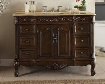 Tocador de baño Beckham de 42 pulgadas, estilo tradicional marrón oscuro, con lavabo individual y encimera de mármol crema.
