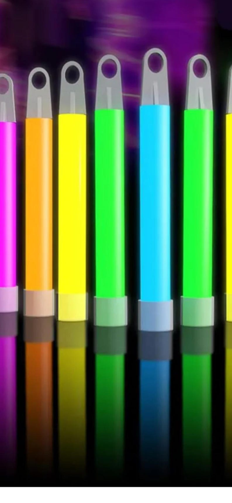 May include: A row of seven cylindrical glow sticks in vibrant colors including pink, orange, yellow, green, and blue. Each stick features a light gray plastic cap with a circular hole at the top and a matching base, standing upright in a line.