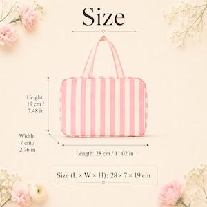 May include: A rectangular pink and white striped bag with two top handles. The bag is labeled with dimensions: height 7.48 inches, width 2.76 inches, and length 11.02 inches. The text 'Size' and 'Size (L x W x H): 28 x 7 x 19 cm' are clearly visible.