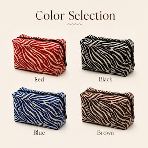 K&ouml;nnte beinhalten: Vier rechteckige Rei&szlig;verschlusstaschen mit Zebramuster in den Farben Rot, Schwarz, Blau und Braun. Der Text Color Selection steht oben, mit individuellen Beschriftungen f&uuml;r Red, Black, Blue und Brown unter jeder der vier Taschen.