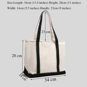 May include: Cream-coloured tote bag with black detailing. The bag is 34 cm long, 28 cm high, and 14 cm wide. The handle is 23 cm. The bag features black handles and a black base.