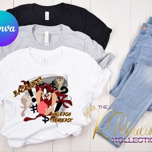 May include: White t-shirt with a cartoon image of Taz the Tasmanian Devil in a tornado. The text "Back Off!" and "Unleash the Beast" are printed on the shirt.
