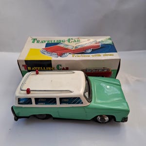 Rare Candy Green Station Wagon Car Tin Friction Toy MF 731 -made in china (BOXED)