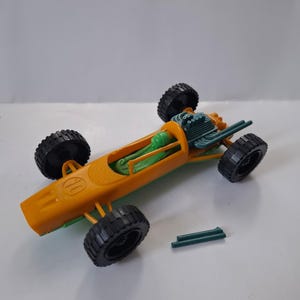 Ferrari F1 vintage de plástico de los años 80, fabricado en Alemania Occidental.