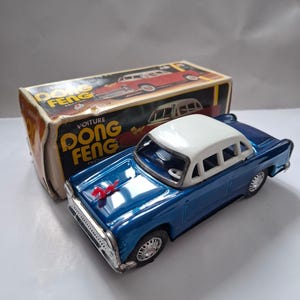 Vintage MF 032 Dong Feng Sedan – Tin Friction Toy with Original Packaging