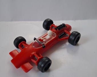 Vintage Lotus Formel 1 Rennauto Nr. 4 - Pennzoil Red Kunststoff Spielzeug 10 cm