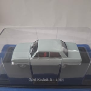 Opel Kadett B 1965 – Hachette 1:43 Die-Cast Model, Blue with Red Interior – Original Plastic Cas