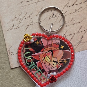 May include: A set of three ceramic mugs with a speckled, matte finish. The mugs are in shades of cream, light gray, and dark gray. Each mug has a simple, modern design and a rounded handle.