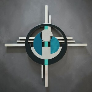 May include: A geometric wall art piece featuring a central dark gray circle enclosing a light gray circle and two teal semi-circles. The design is layered over a series of horizontal and vertical light gray bars that extend outward in a cross shape.