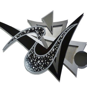 May include: Abstract wall art sculpture with black, white, and silver geometric shapes. The sculpture features a swirling, intricate design with a black circle in the lower right corner.