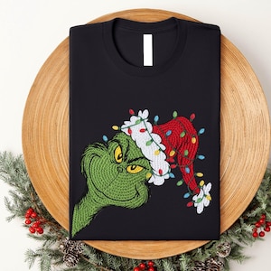 Grinch Christmas Lights Shirt, Feeling Extra Grinch Holiday Grinch Shirt, Grinchmas Shirt, Grinch Santa Hat Xmas Shirt, Merry Christmas 2025