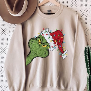 Grinch Christmas Lights Sweatshirt, Holiday Grinchmas Hoodie, Grinch Santa Hat Xmas Sweatshirt, Merry Christmas 2025 Feeling Extra Grinch