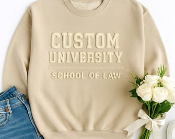 Moletom universitário personalizado: gola redonda com texto em relevo, presente para estudantes.