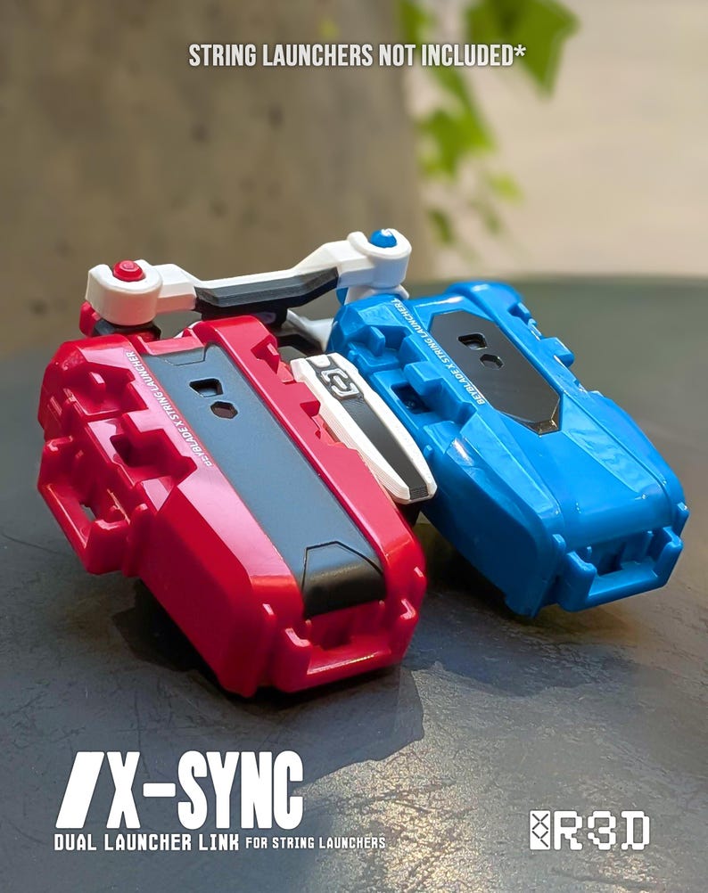 May include: A red and a blue dual launcher link for string launchers. The red launcher has a black top and white accents. The blue launcher has a black top. The text "X-SYNC" and "DUAL LAUNCHER LINK FOR STRING LAUNCHERS" are visible.