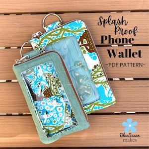 May include: Two splash-proof phone wallets with clear windows and zipper closures. The wallets feature a teal and white floral pattern with brown accents. The text "Splash Proof Phone Wallet - PDF Pattern-" is visible.
