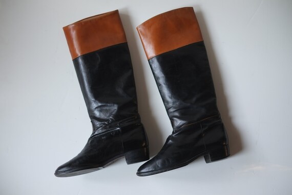 tall black boots with low heel