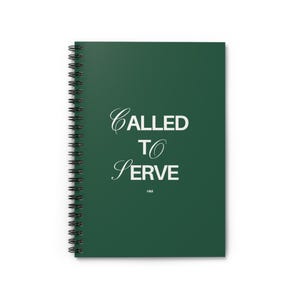 May include: A spiral-bound notebook with a dark green cover. The cover features the white text "CALLED TO SERVE" in a mix of script and block letters. The notebook has a black metal spiral binding.