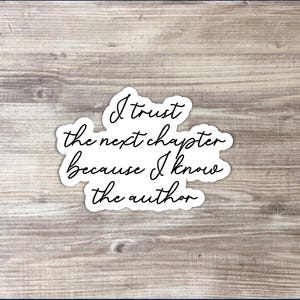 May include: A white sticker with black text that reads "I trust the next chapter because I know the author".