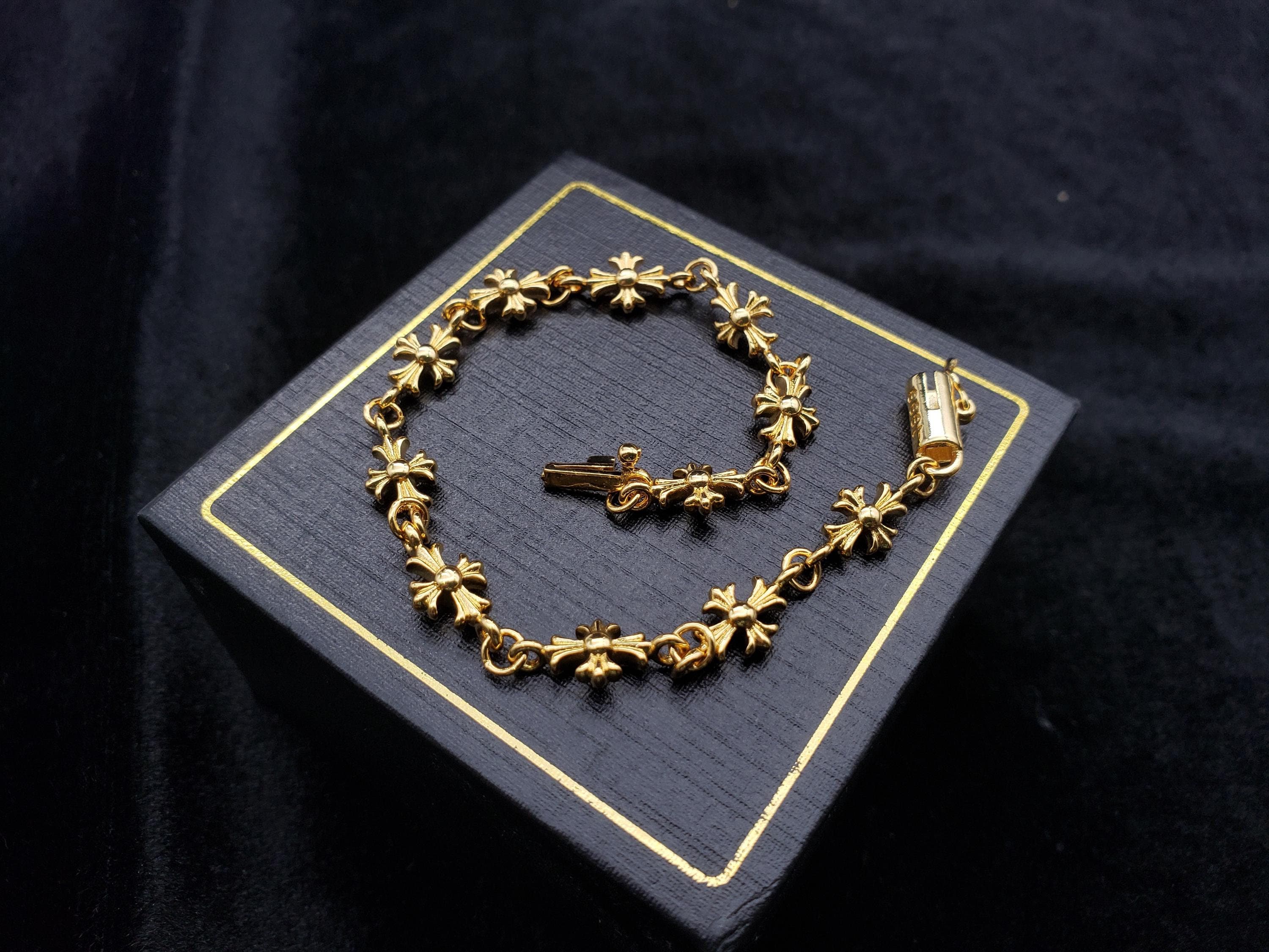 Nike bracelet gold best sale