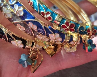rigid spring bangle bracelet with colorful enamel and small flower motif, stainless steel charms and beads - gift