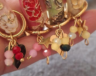 Rigid spring bangle bracelet with colorful enamel peony flower motif and heart or star charms and beads - perfect for birthdays, parties, and Christmas.