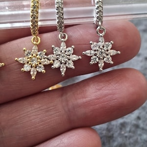 Single hoop earrings in stainless steel 316 with a star or flower pendant set in cubic zirconia – a perfect birthday gift