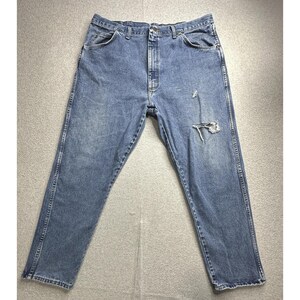 Jeans Wrangler vintage para hombre, talla 39x27.5, denim azul, tiro alto, desgastados, rotos, auténticos. imagen 8
