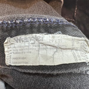 Calça jeans vintage Wrangler masculina, tamanho 28x31, preta, corte cowboy, perna reta, desbotada, fabricada nos EUA. imagem 3