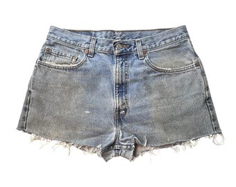 Vintage Levi's 505 Denim Shorts Womens 34 Light Blue Cut Off Raw Hem Frayed Y2K