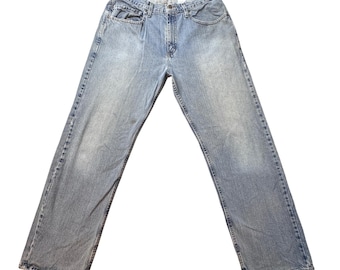 Jeans vintage Levi's da uomo, taglia 32x32 (34x30), lavaggio chiaro, vestibilità ampia, denim dritto, anno 2000.
